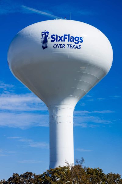 Six Flags over Texas is nearby the Caravan Court Hotel